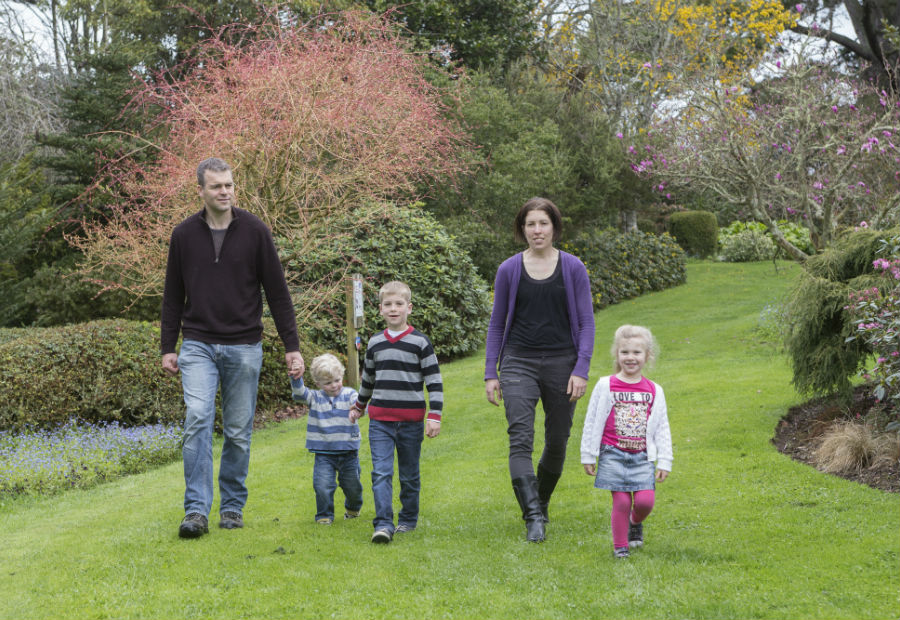 Photo of a family enjoying a walk at Hollard Gardens